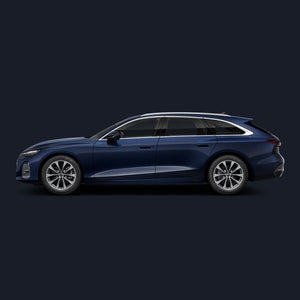 Seitenansicht eines dunkelblauen Audi A6 Avant auf dunklem Hintergrund.