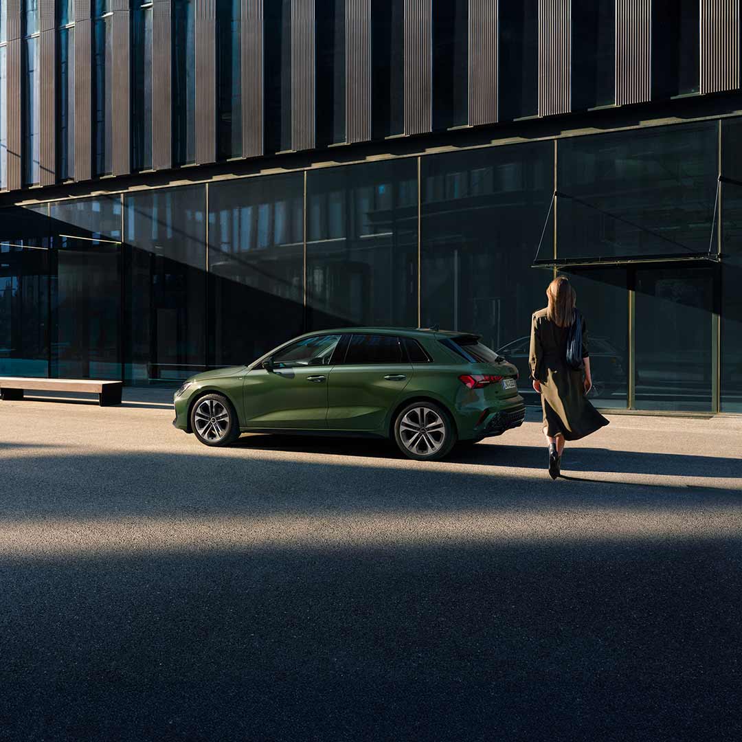 image of a car and a woman