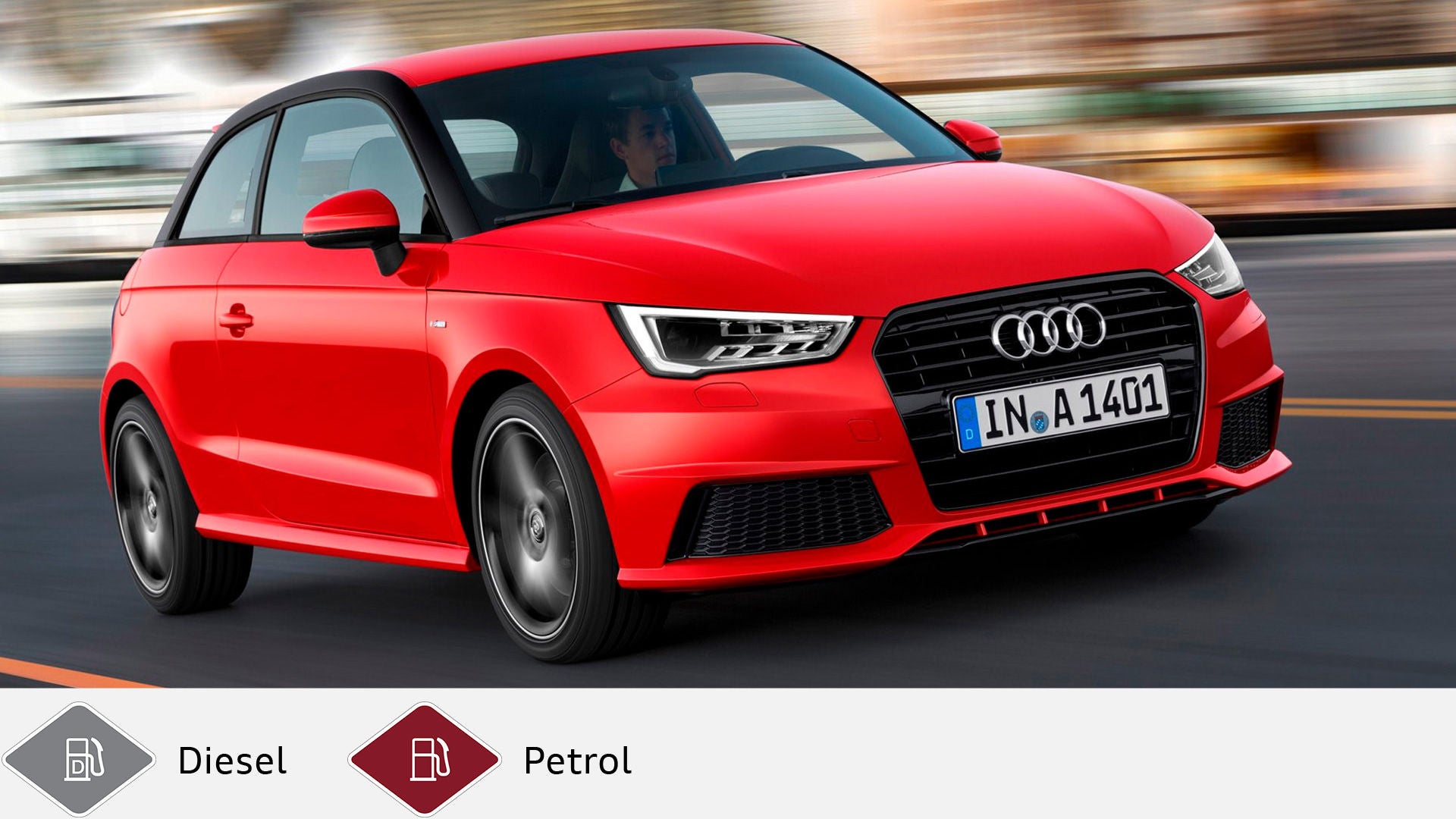 Red Audi A1 3-door driving on a city street, shown diagonally from the front. Gray diesel symbol and red petrol symbol at the bottom.