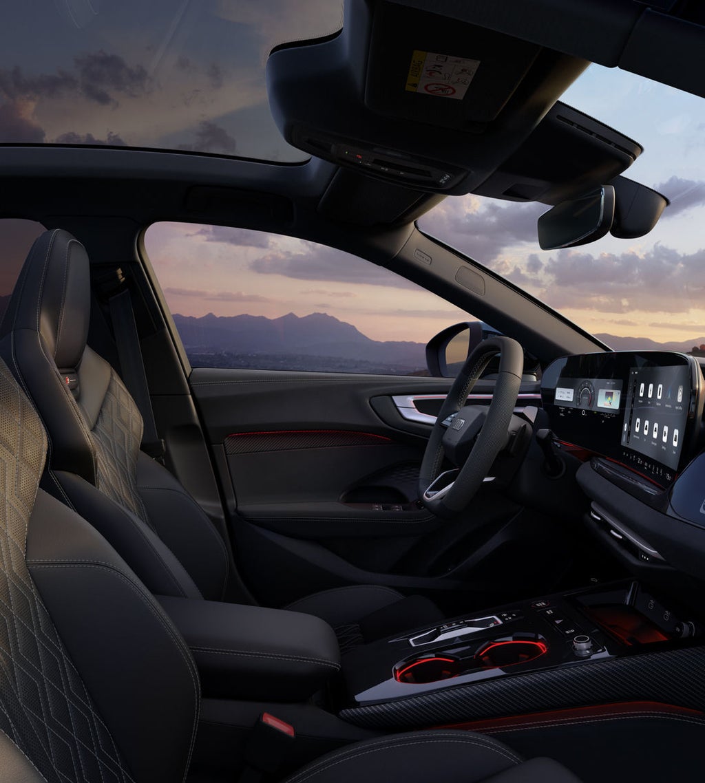The cockpit of the S5 Saloon from the passenger's perspective, focusing on the steering wheel and the panoramic display.
