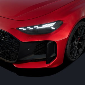 Focus on the dark Matrix LED headlights with “checkered flag” light design.