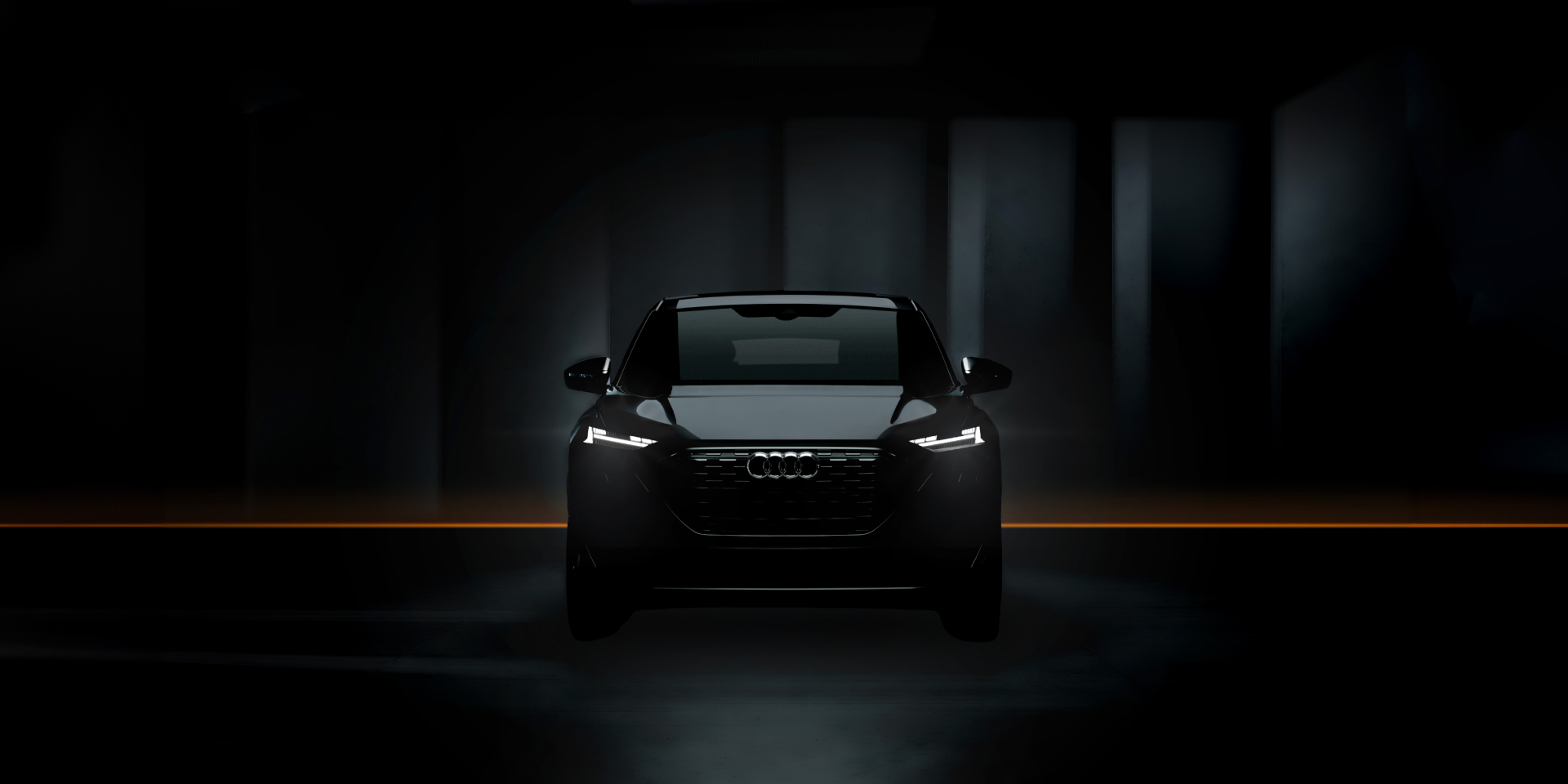 A black car with illuminated headlights in a dimly lit environment, accentuated by a subtle orange glow.