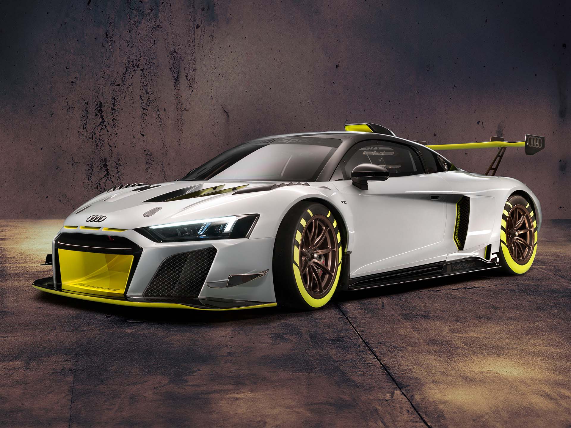 A picture showing the Audi R8 LMS GT2 race car on display.