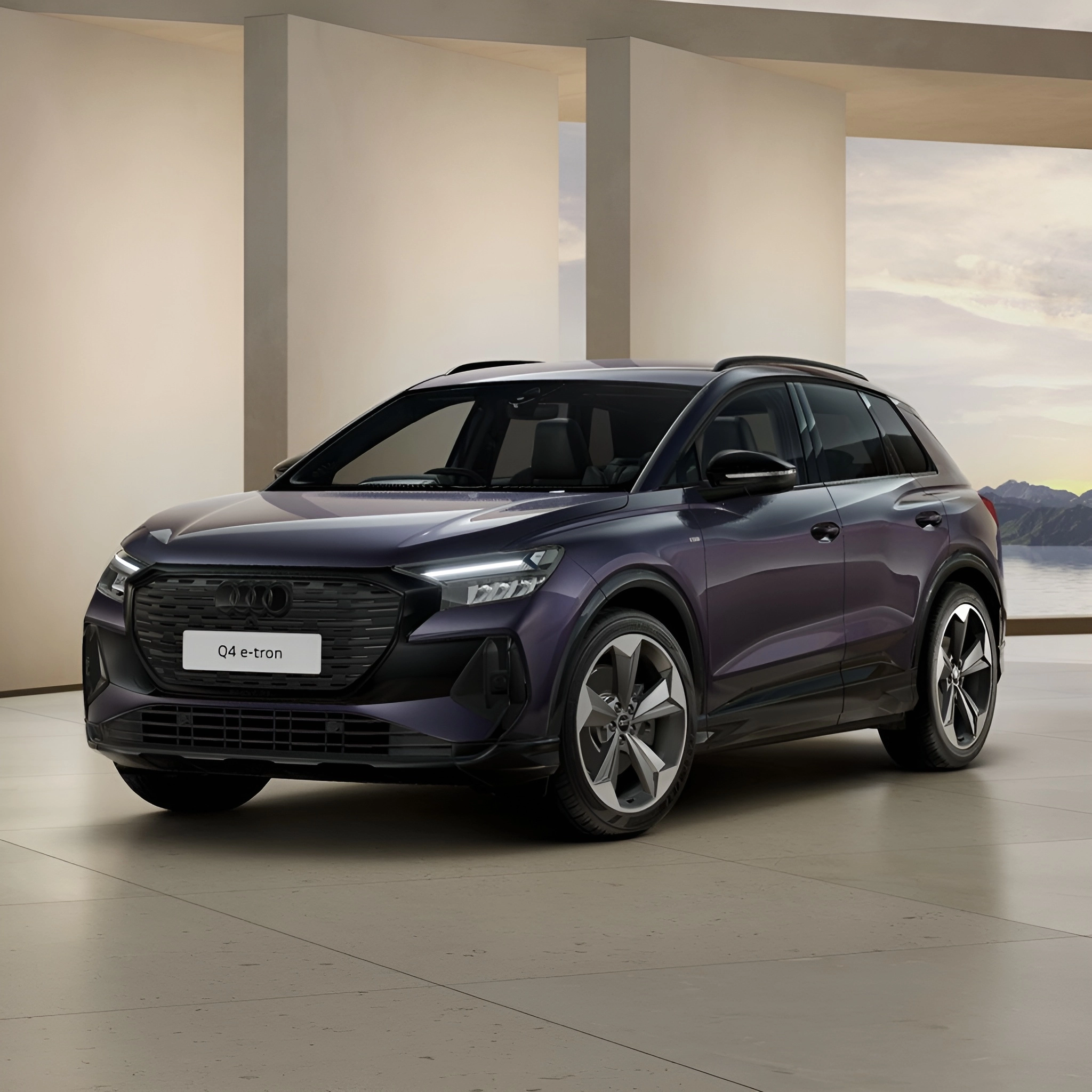 Audi Q4 e-tron, a purple SUV with Black Edition trim, parked on a tiled floor, facing left, with a white plate on the front grill.
