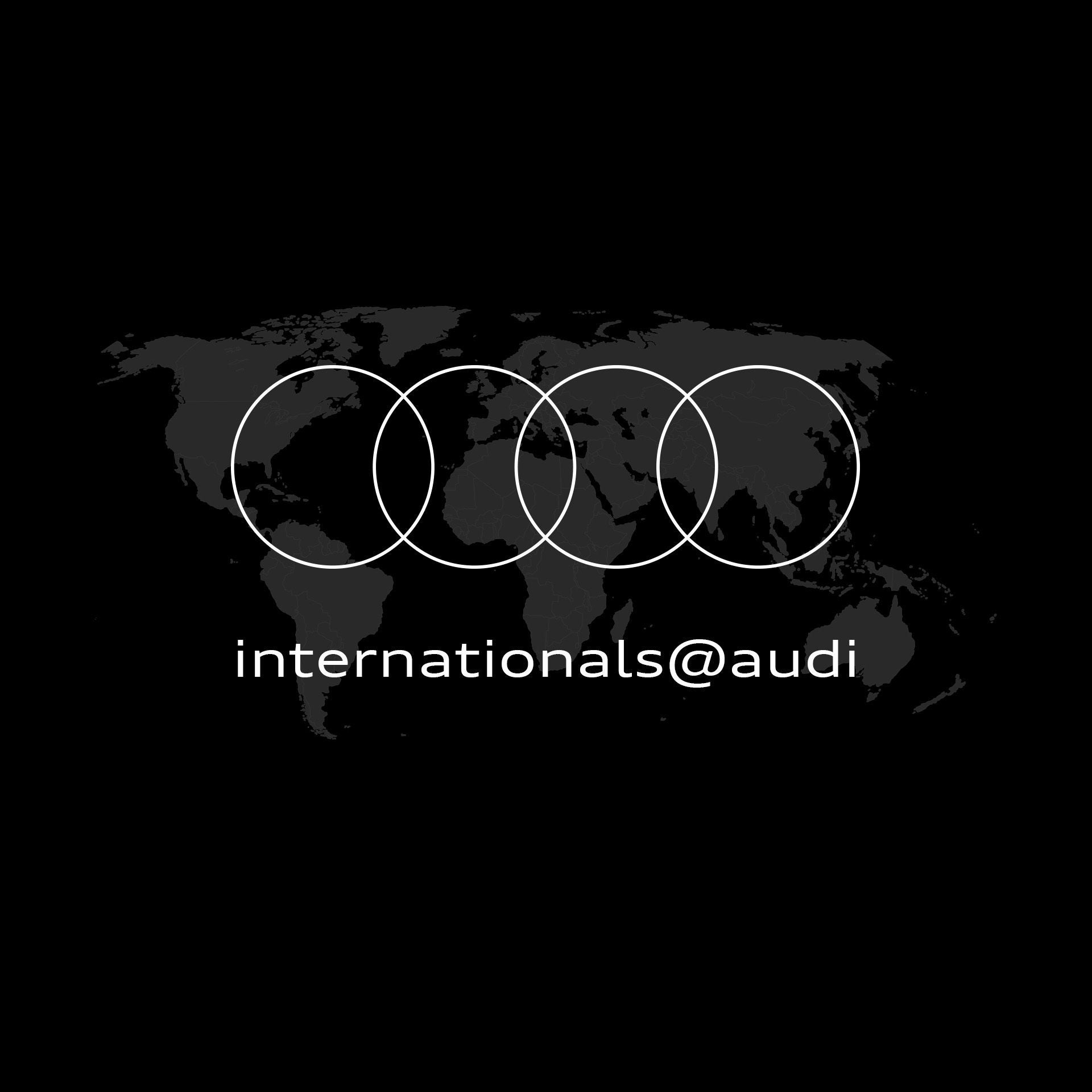 Eine Weltkarte mit dem Audi Logo und Schriftzug internationals@audi
