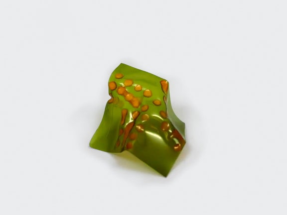 A piece of plastic on a table.