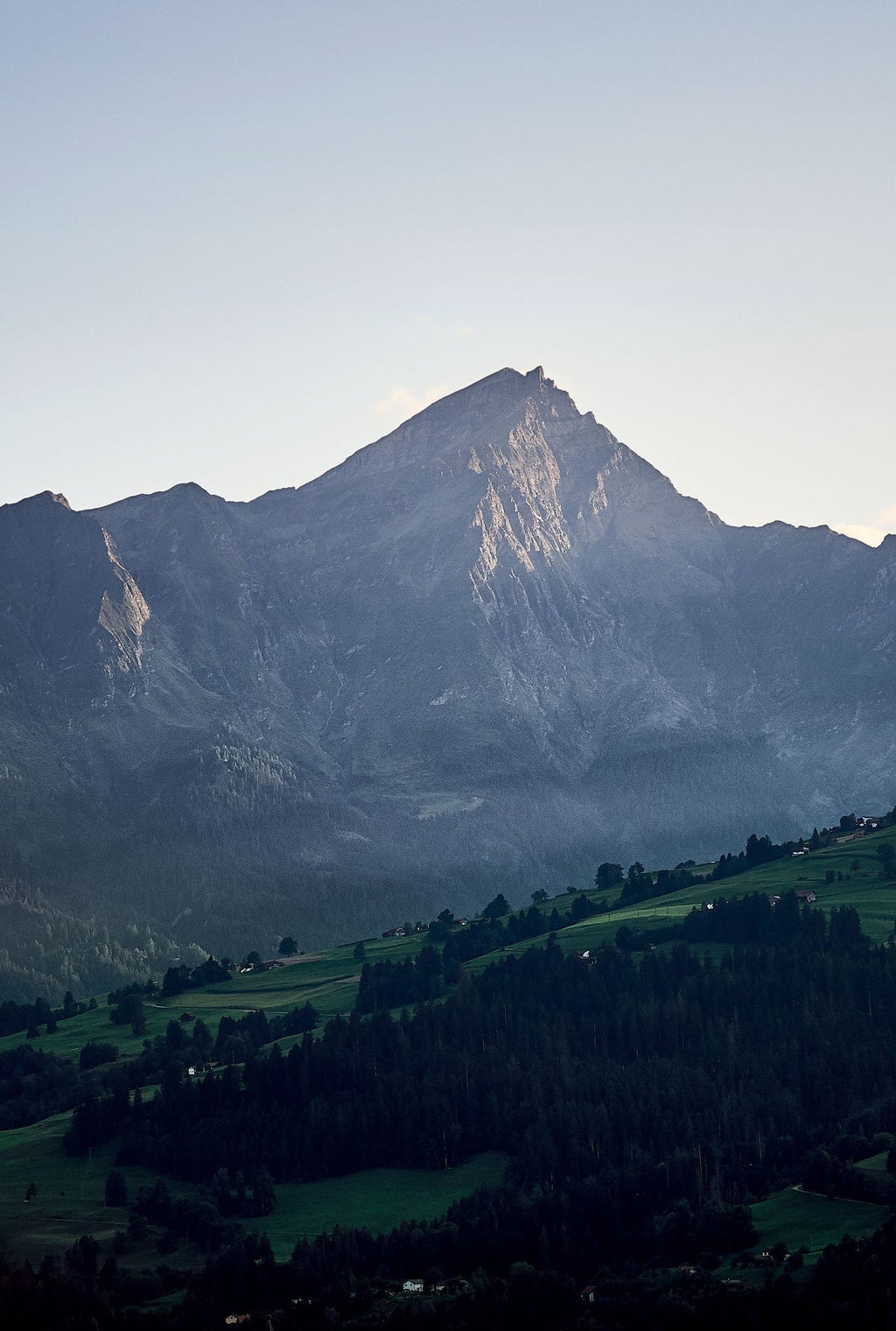 Evening falls over the mountains.