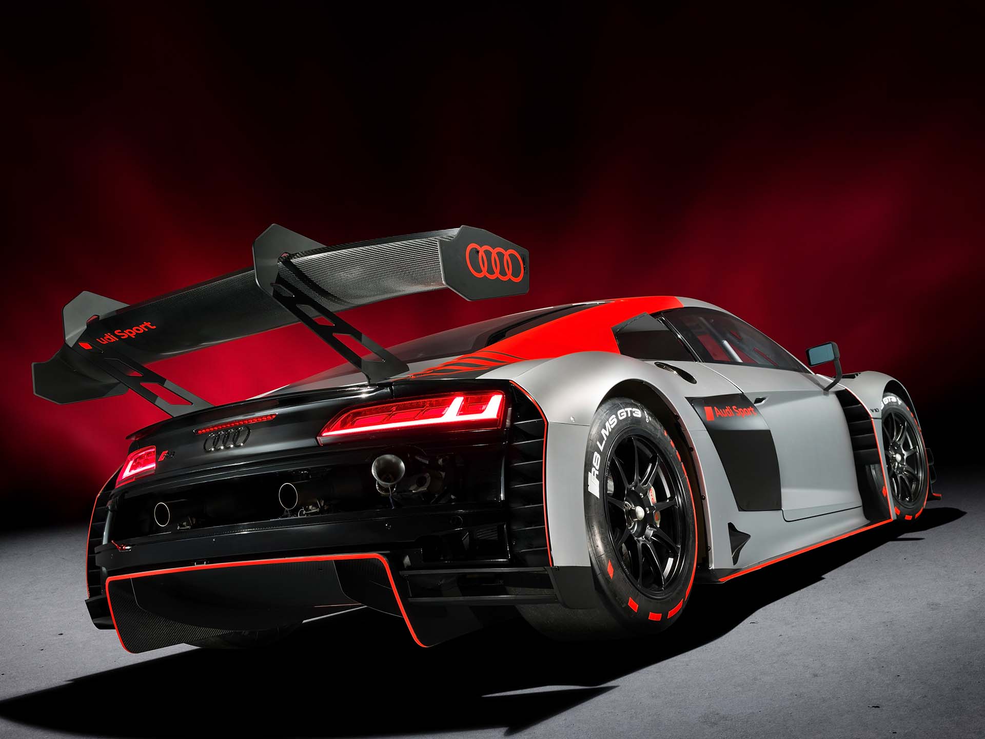 A picture showing the Audi R8 LMS GT3 race car on display.