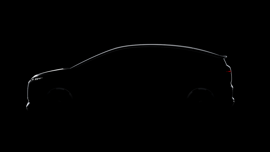 Silhouet van de nieuwe Audi A2 e-tron tegen een zwarte achtergrond, waarbij de aerodynamische vorm en kenmerkende lichtsignatuur goed uitkomen. Wordt verwacht vanaf najaar 2026.