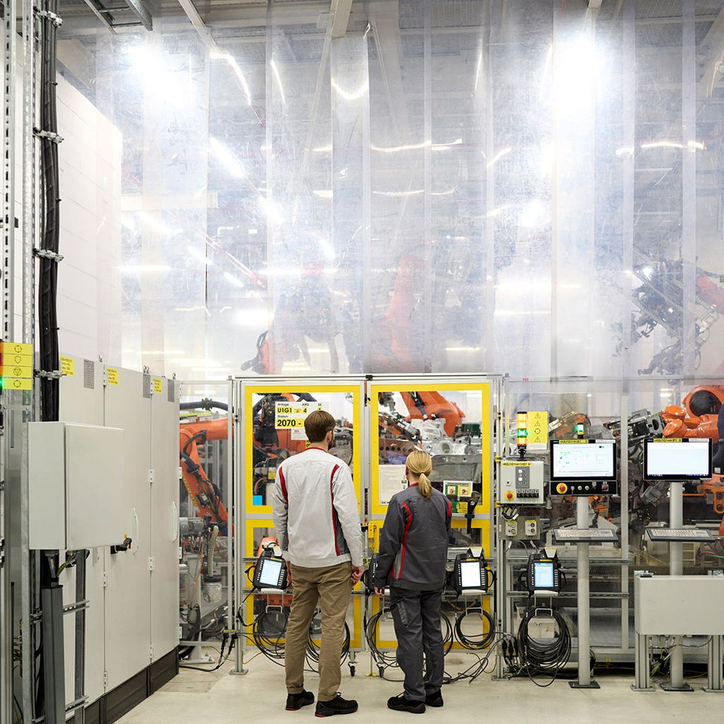 Andreas checks the robots in production at Audi