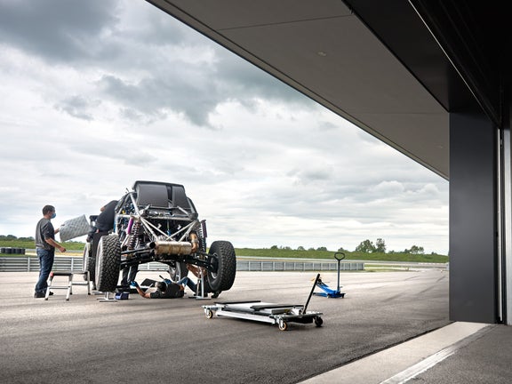 The vehicle is assembled in the open air.