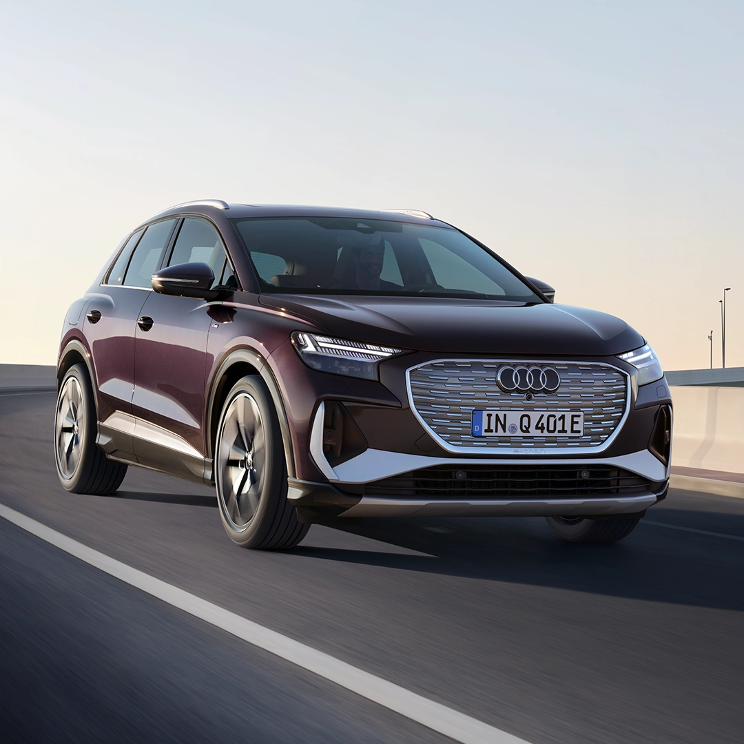 Audi Q4 e-tron driving on a road, 1:1