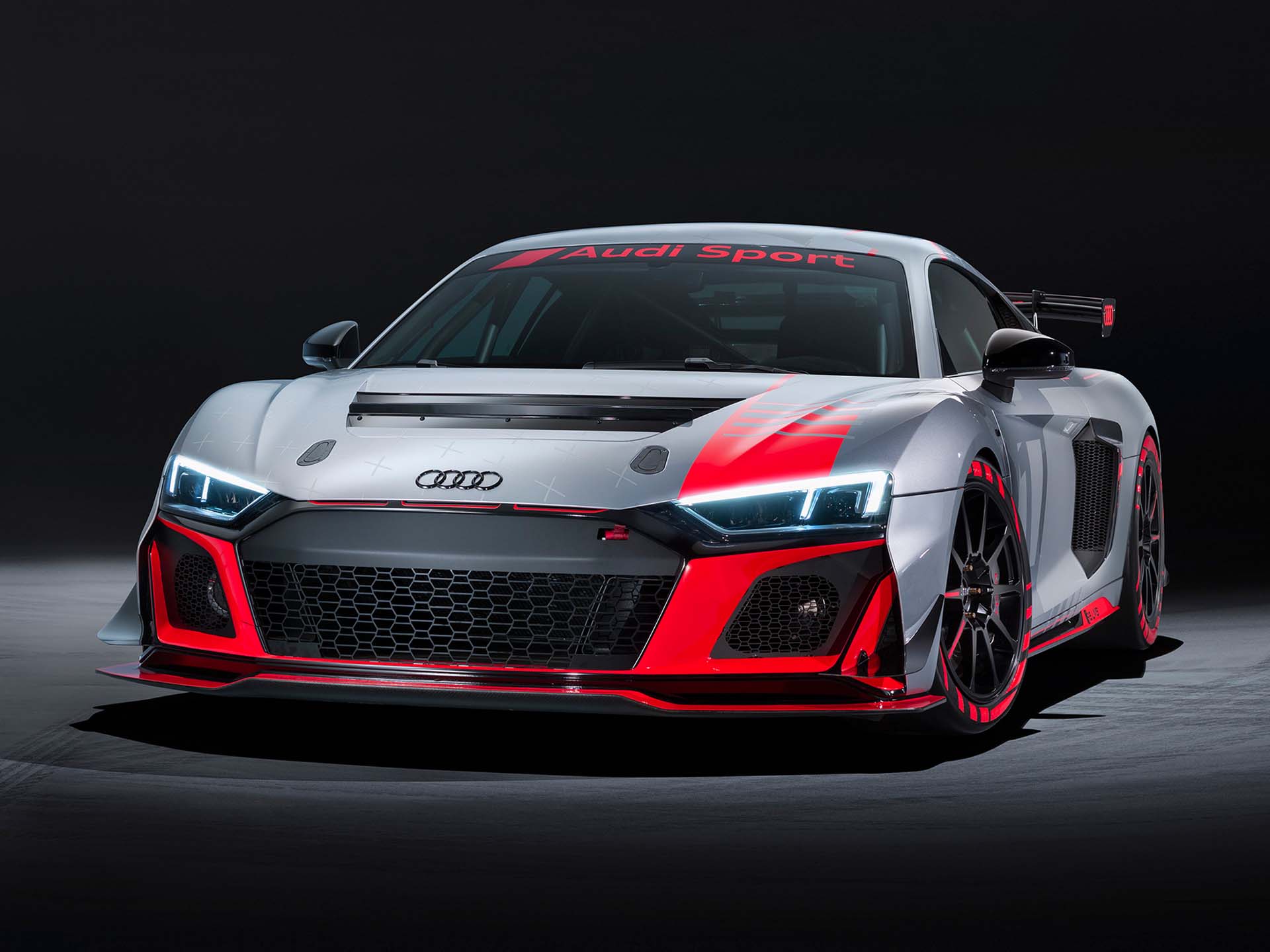 A picture showing the Audi R8 LMS GT4 race car on display.
