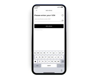 The myAudi app displaying the screen to add your VIN, either via a photo or text entry