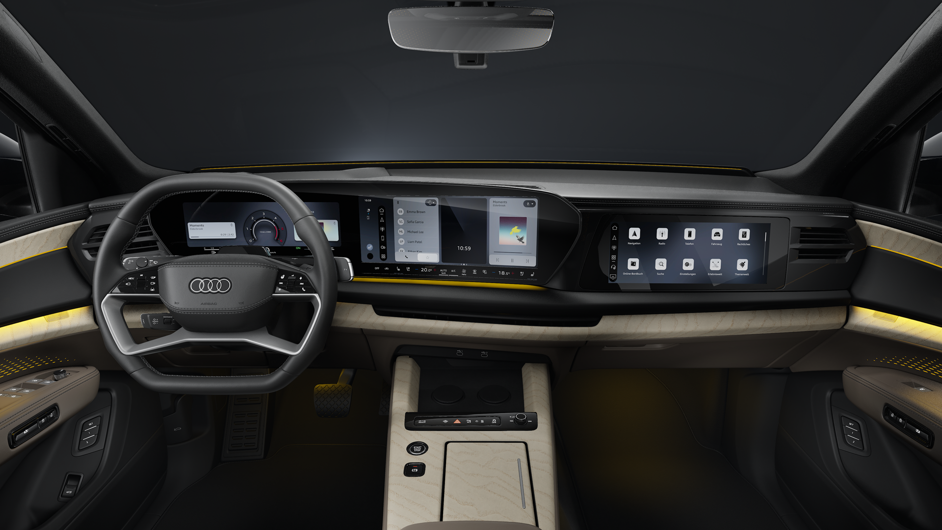 Blick von der Rückbank in das Cockpit des Audi Q9 SUV. Im Fokus das Lenkrad und die Panoramadisplays mit dem Audi Virtual Cockpit und dem MMI Display.