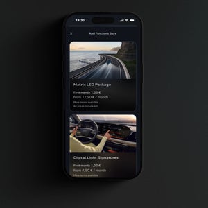 Nærbillede af en smartphone-skærm. Brugeren er i Audi Functions Store for en S6 Sportback e-tron. 