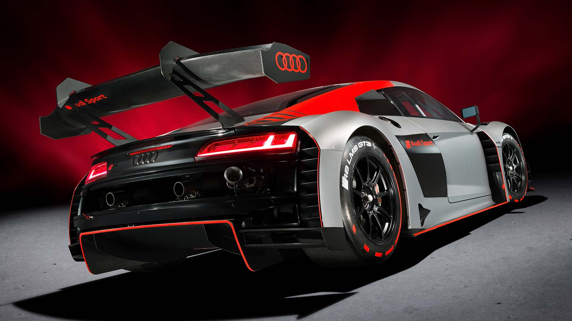 A picture showing the Audi R8 LMS GT3 race car on display.