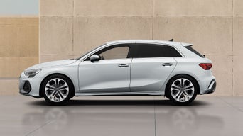 S3 Sportback parked near tile beige wall