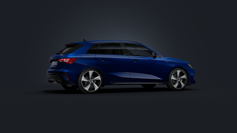 The Audi A3 Sportback, viewed from the side against a dark background.