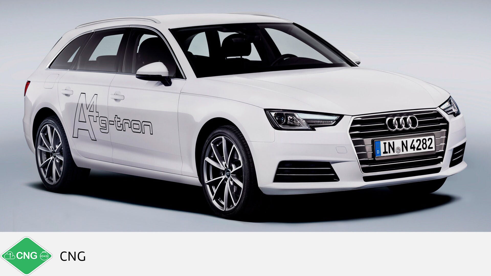 White Audi A4 Avant g-tron in the studio, seen from behind slightly to the left. Green CNG symbol with text at the bottom.