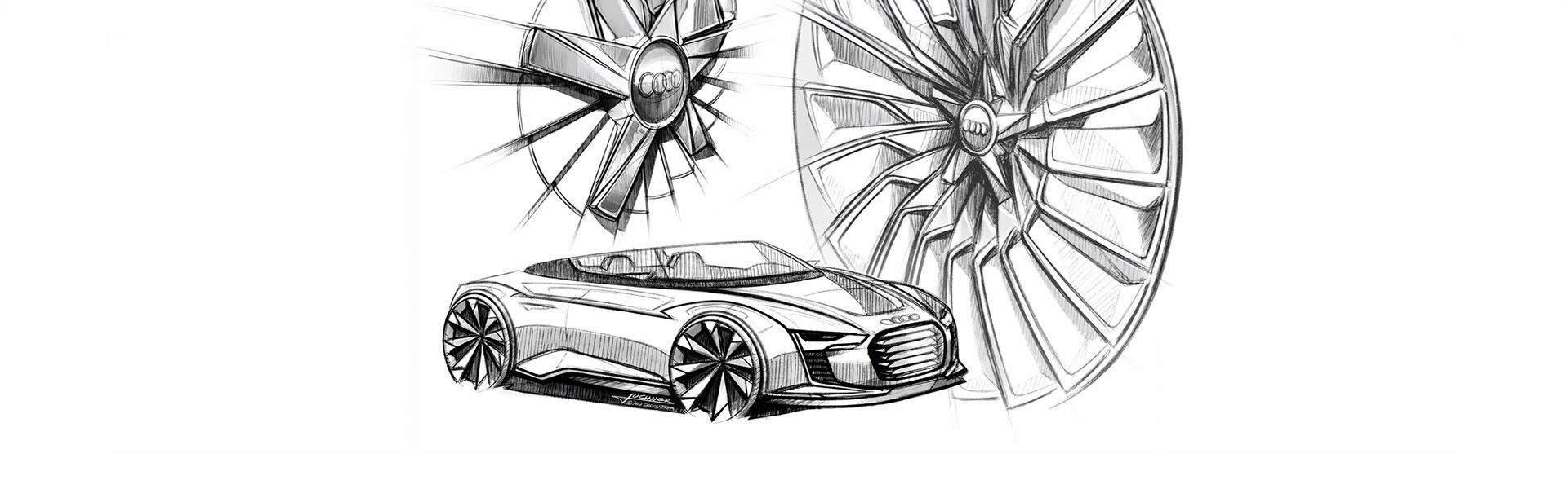 Skizze eines Audi Concept Cars mit detaillierten Felgendesigns und Audi-Logo in Schwarz-Weiß.