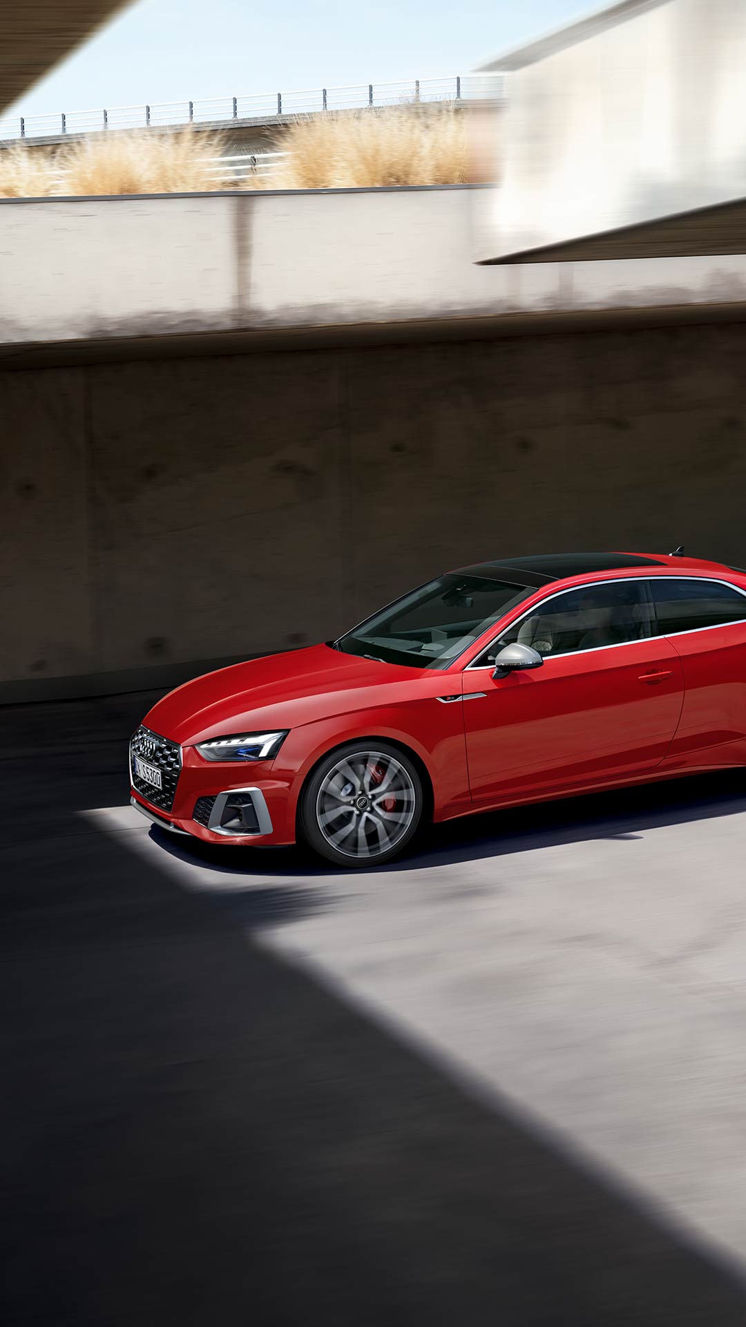Dynamic side view of the Audi S5 Coupe