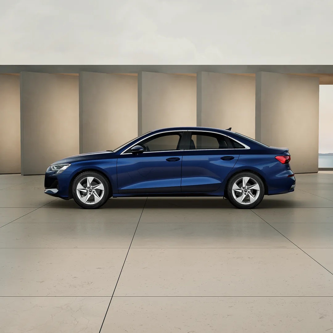 Blue A3 Saloon outside beige wall