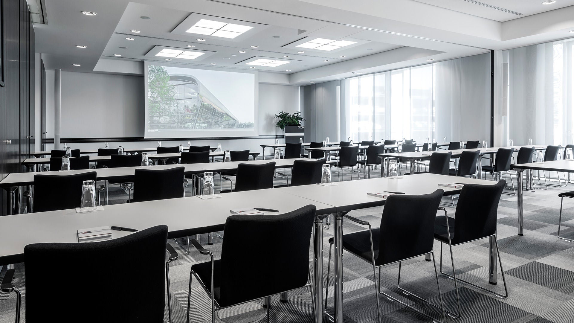View of a conference room with projector screen