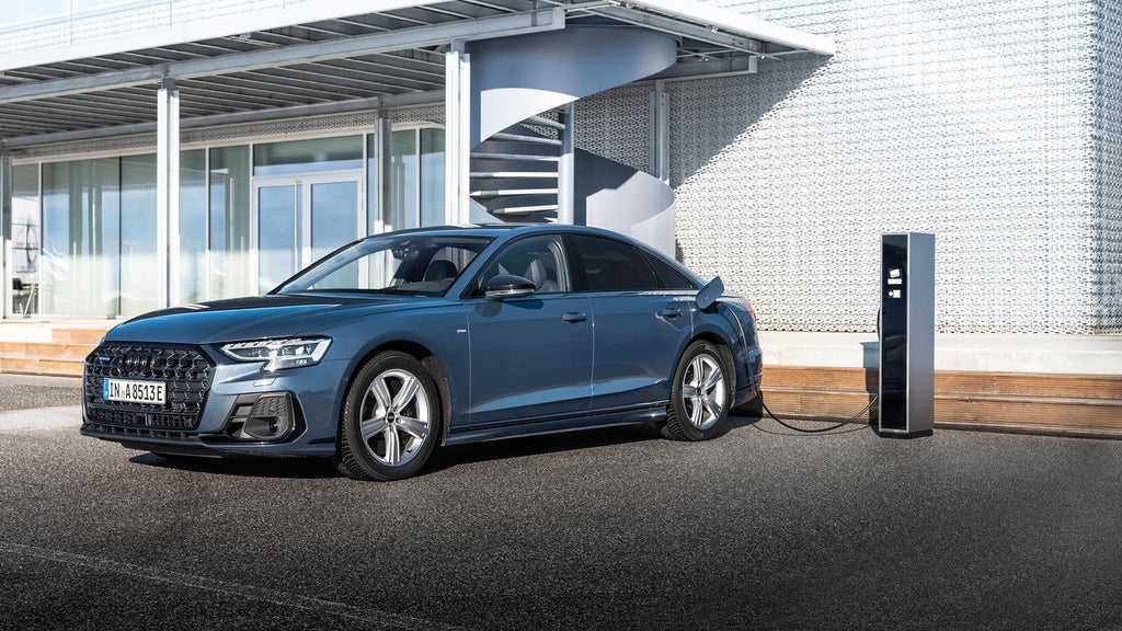 Foto del consumo de un coche híbrido enchufable. 