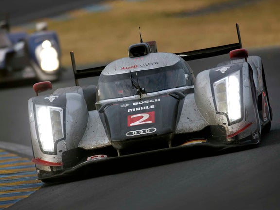 A picture showing the victorious Audi R18 TDI on track at Le Mans in 2011.