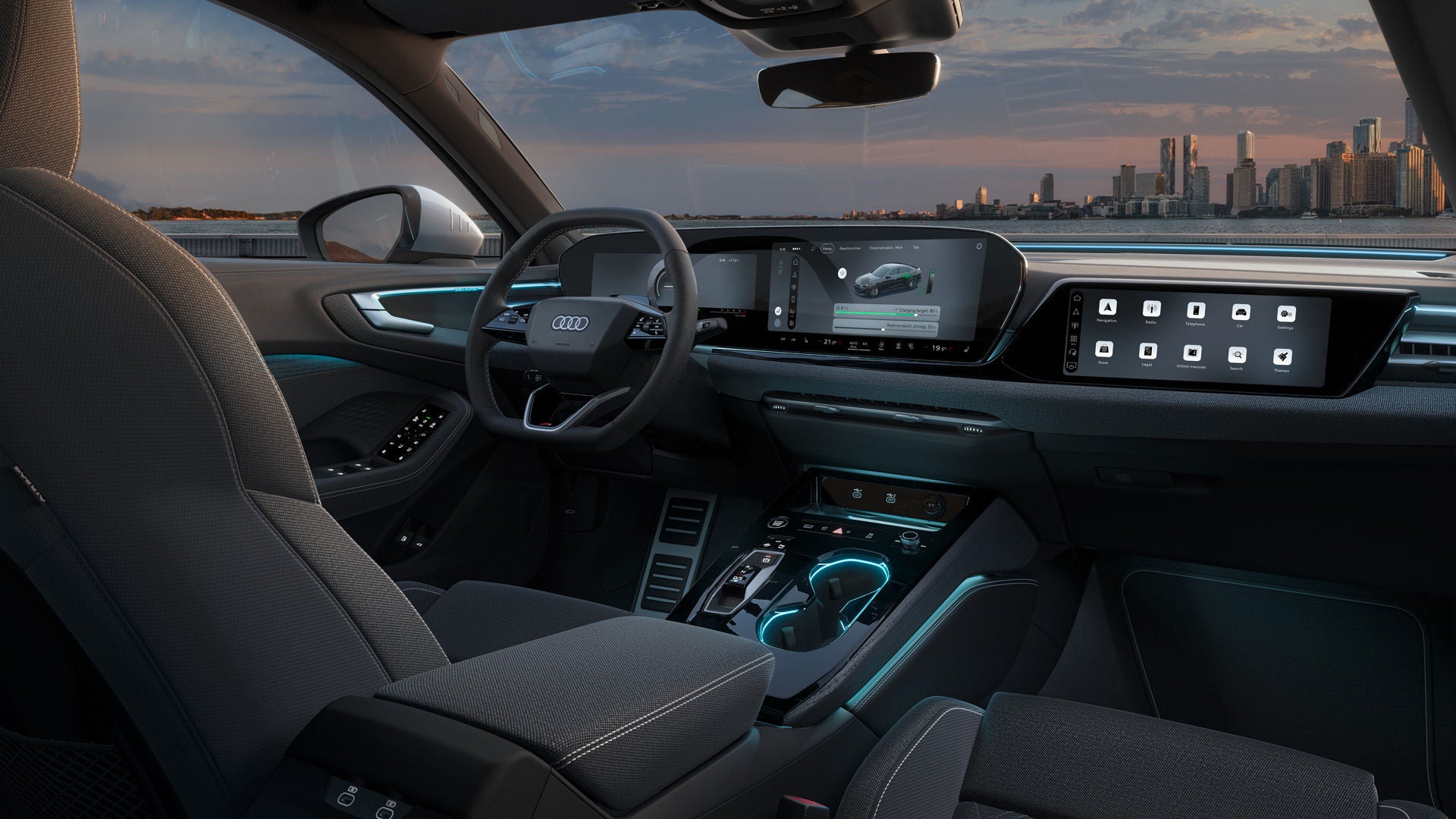 Vy över cockpiten i A5 e-hybrid. Bland annat syns panoramaskärmarna och stämningsbelysningen.