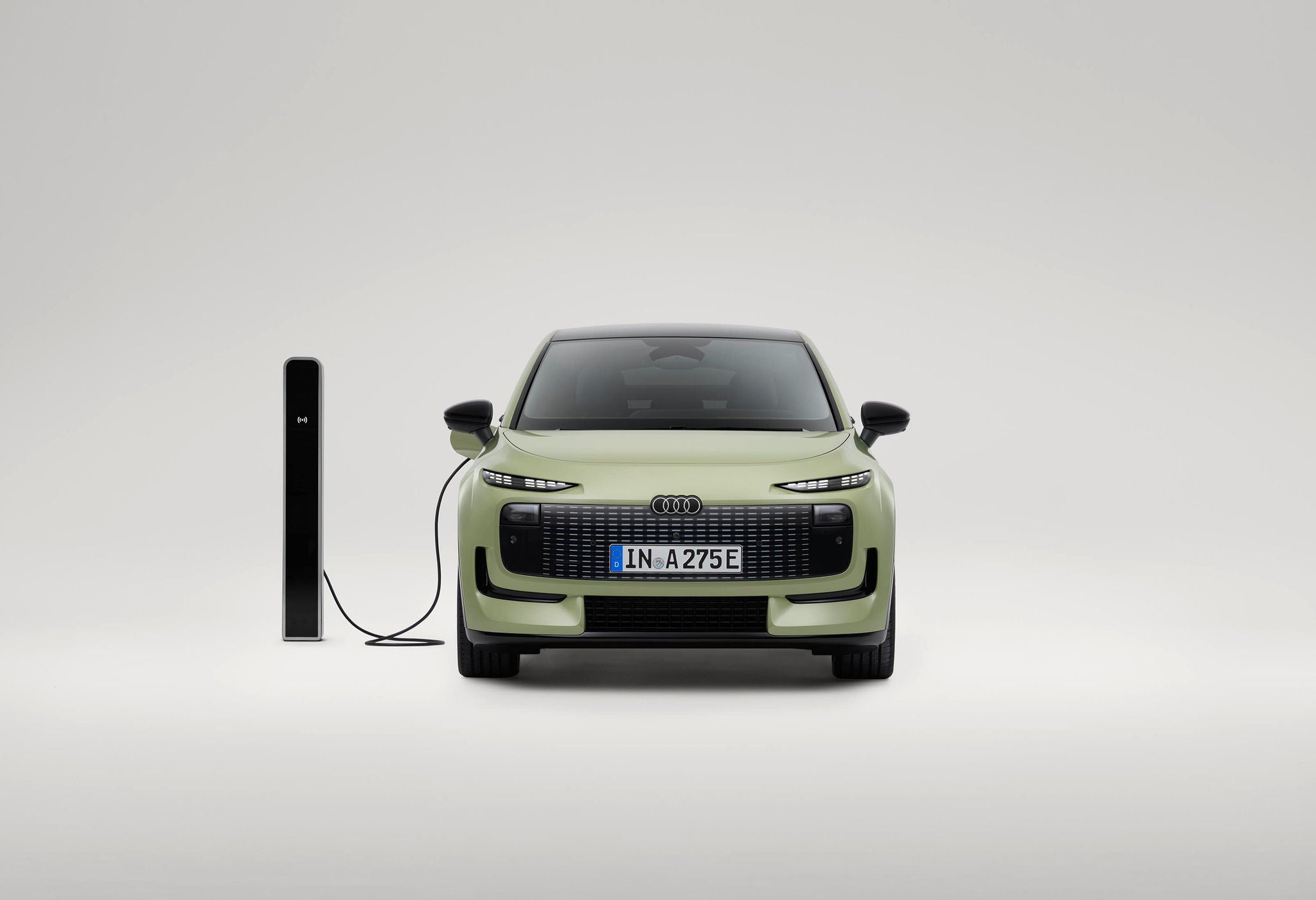 Audi A2 e-tron electric car with charger