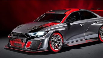 Audi R8 LMS GT3 with red accents and custom bodywork on a red backdrop