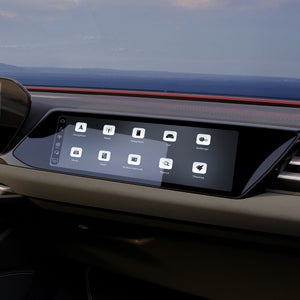 Close-up of the front passenger display in the cockpit of the S5 Avant. A strip of red ambient light glows beneath the windshield.