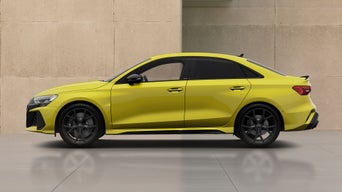 Yellow RS 3 Saloon near beige wall