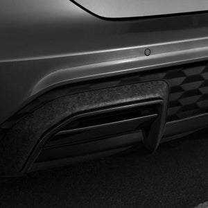 The rear of an Audi car featuring a forged carbon rear diffuser
