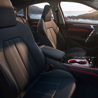 Interior of a car with emphasis on the chair details, as seen from passenger seat view