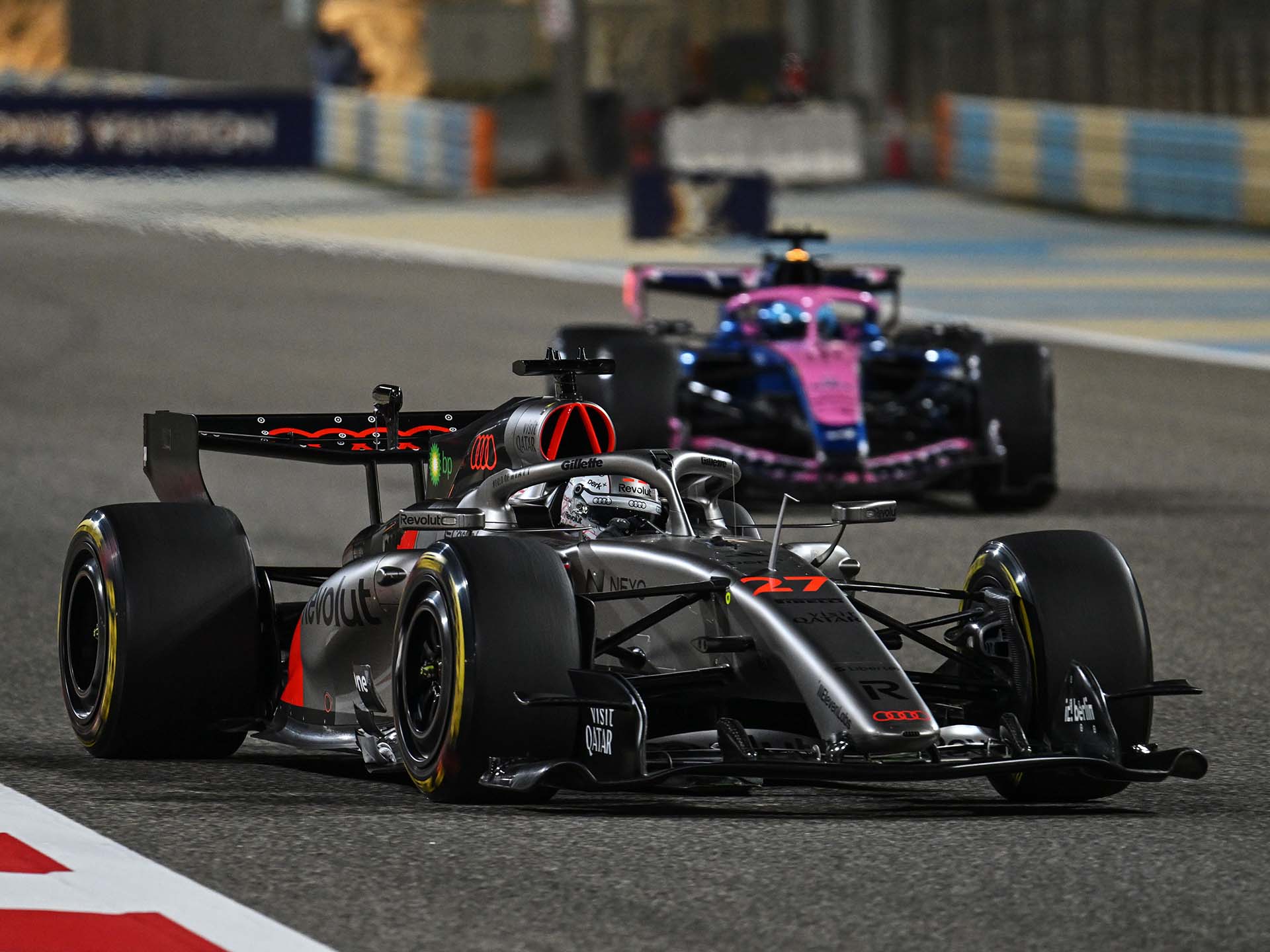 A picture showing the Audi R26 on the race track in Bahrain.