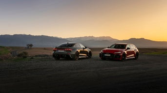 Photo shoot of an Audi RS5 Sedan in Bedford Green Metallic and an Audi RS5 Avant in Progressive Red Metallic