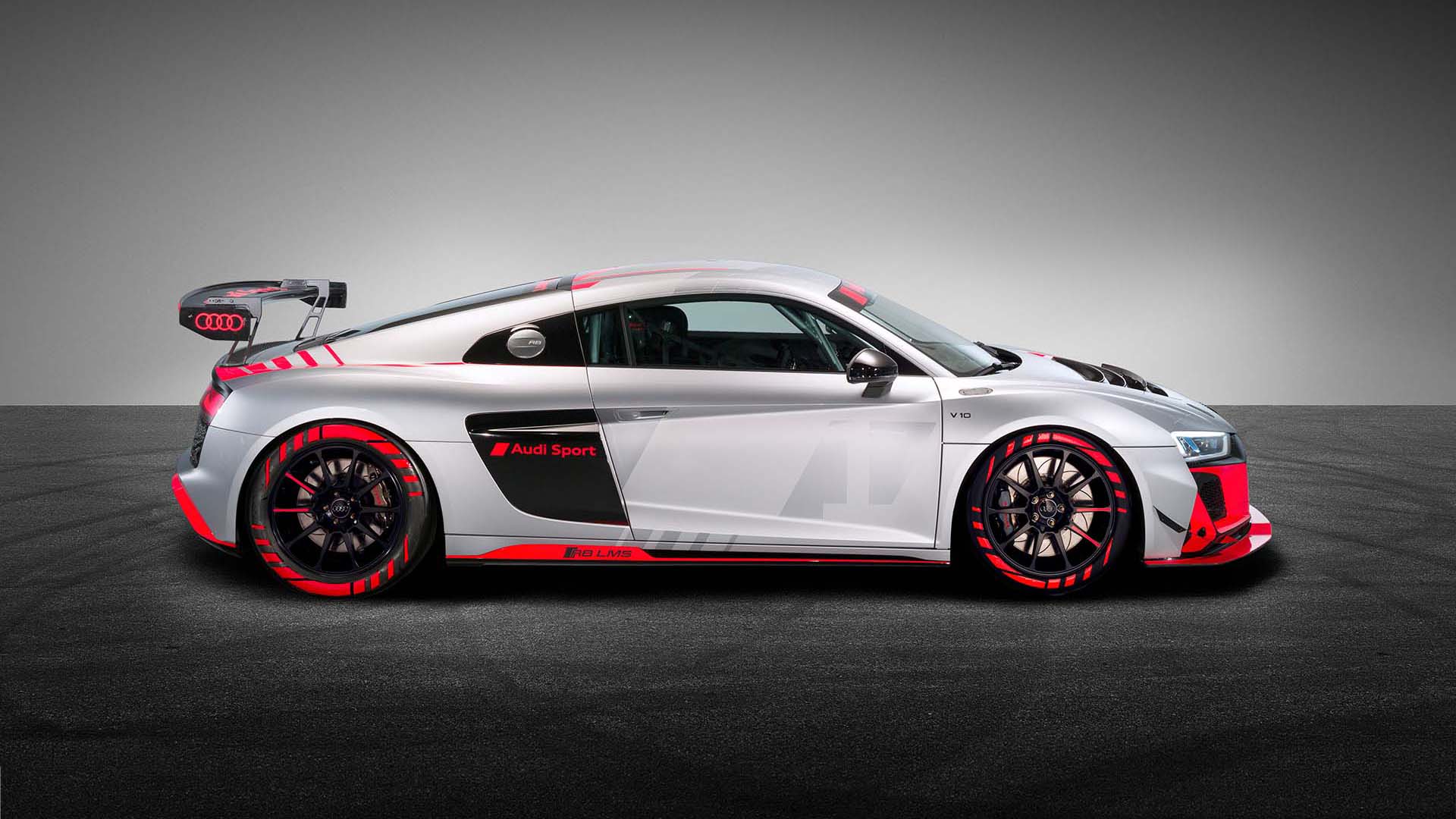 A picture showing the Audi R8 LMS GT4 race car on display.