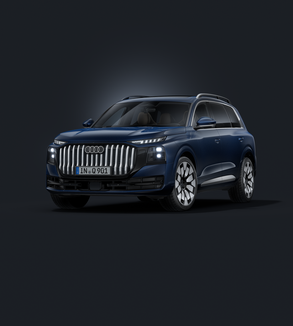 Der Q9 SUV schräg von vorne auf dunklem Hintergrund.