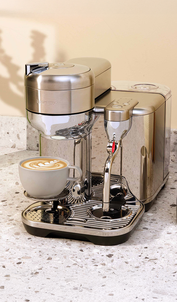 A landscape image of the Nespresso Vertuo Creatista coffee machine.