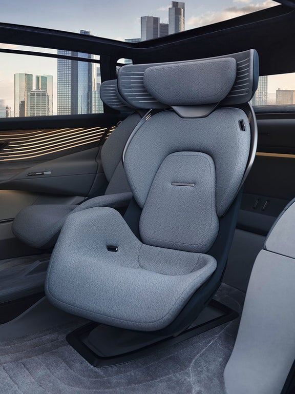 Interior view, in the center the rear left seat - slightly turned towards the door.