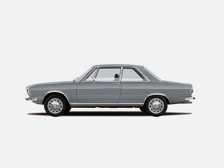Illustration des Audi 100 in Grau auf weißem Hintergrund