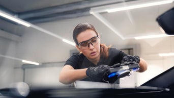 Foto de la garantía de excelencia del servicio reparación Carrocería Elite de Audi. 