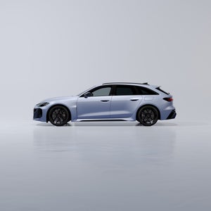 Side view of the Audi RS 5 Avant in the special Singapore paint finish.