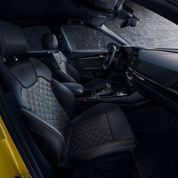 Interior view of the Q5 Sportback with yellow decorative stitching on the seats and details