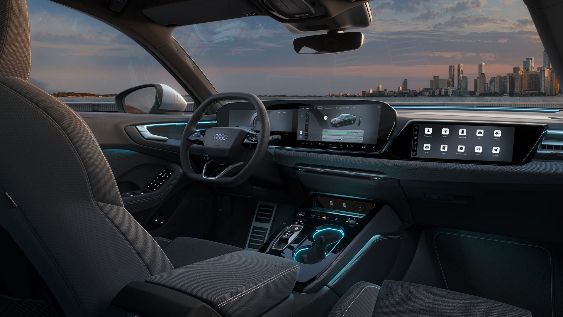 Zicht op de cockpit van de Audi A5 Berline e-hybrid. Onder meer de panoramadisplays en de sfeerverlichting zijn zichtbaar.