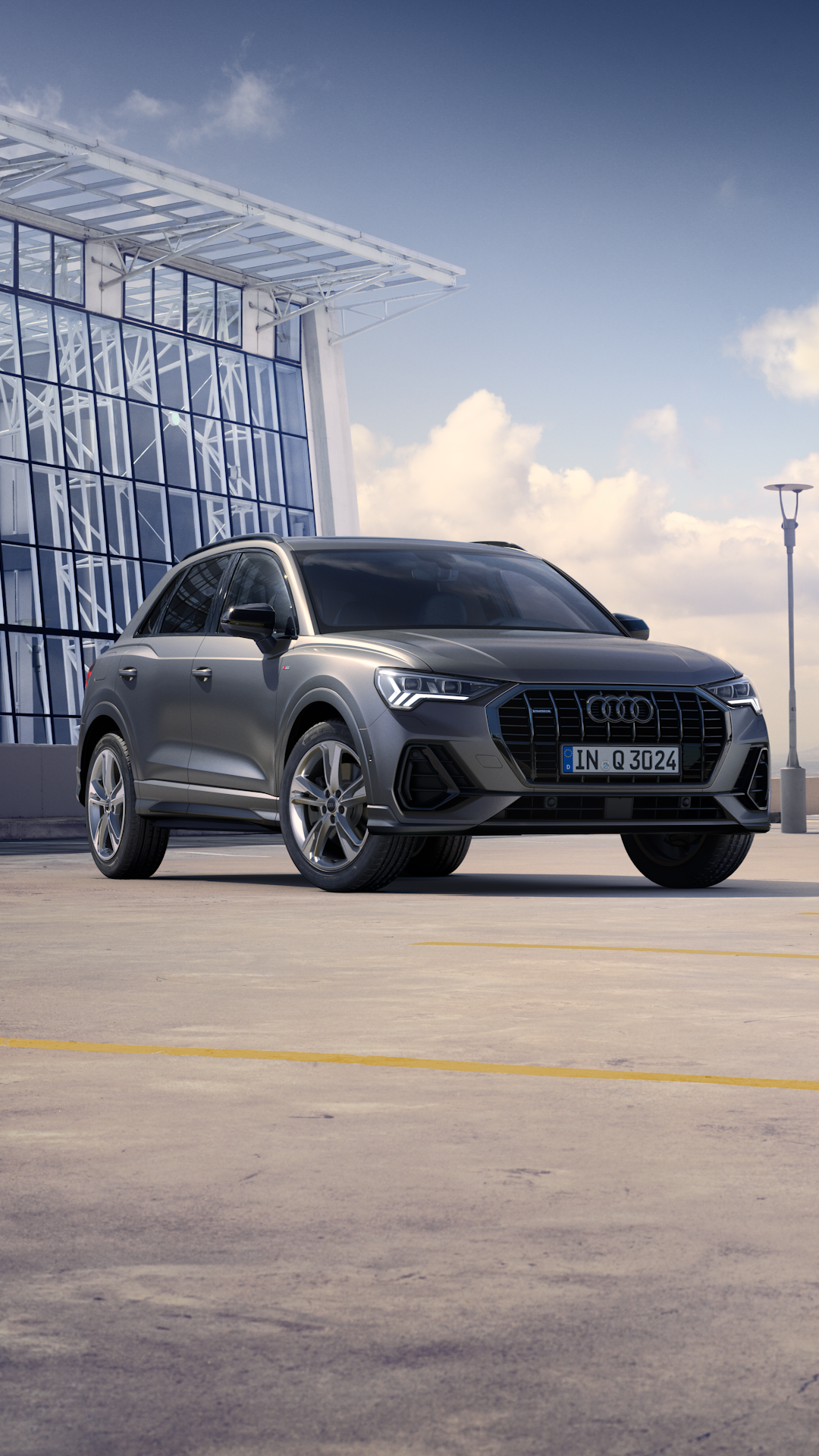 To Audi Q3 parkeret
