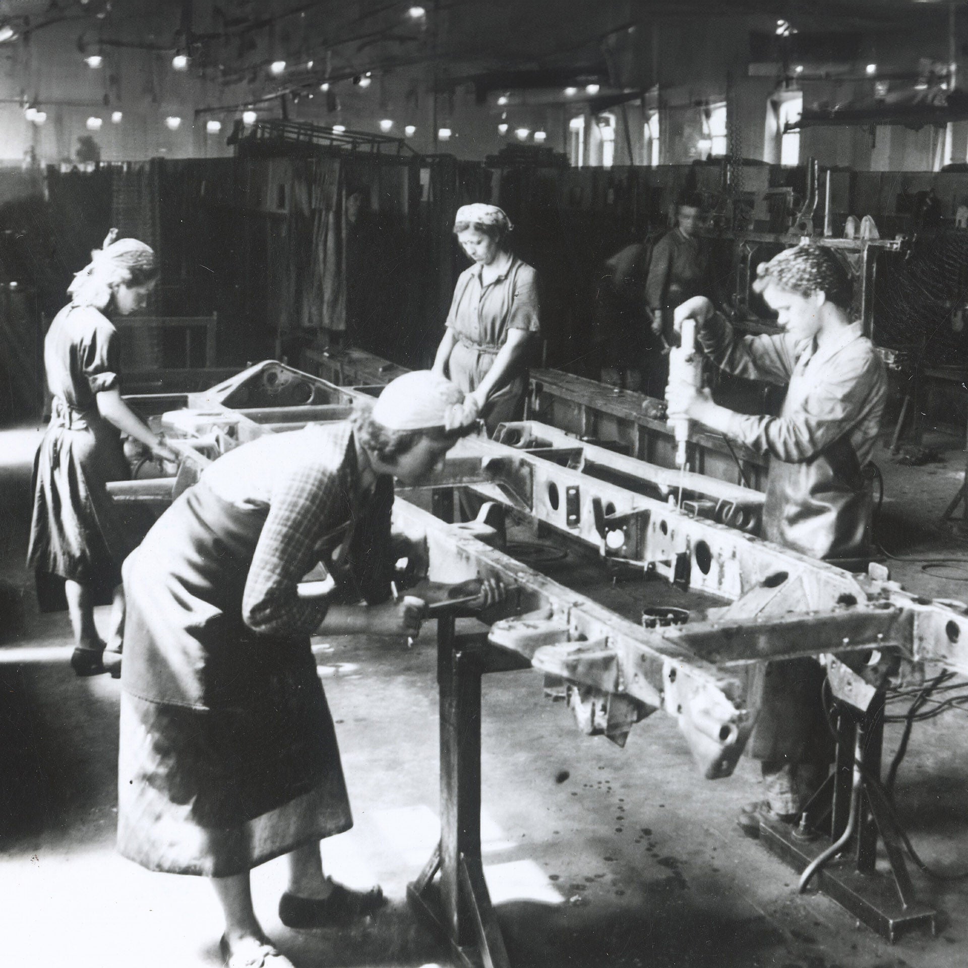 Female forced labourers assembling a chassis (1942).